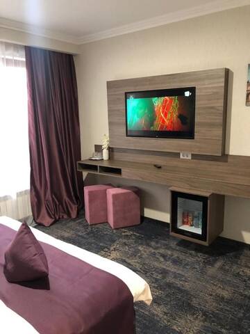 Фото номера Номер с кроватью размера «king-size» Отель Hotel Yarus Plus г. Плоешти 5